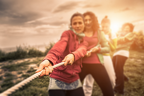 Women playing tug of war