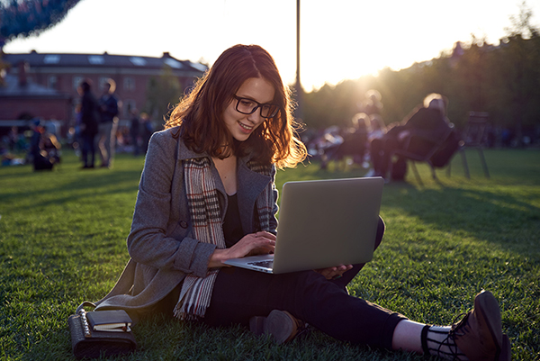 College woman on a laptop