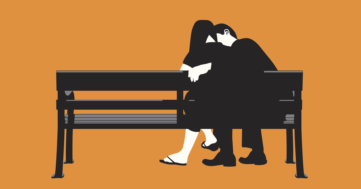Teen couple on a bench