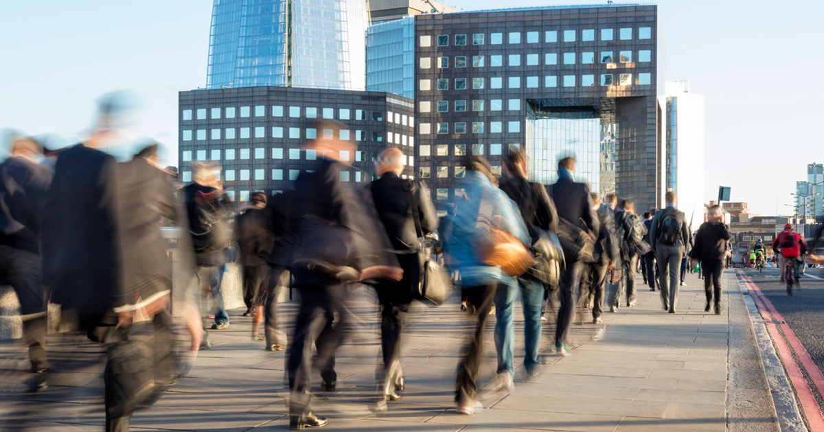 backs facing people walking away in an urban background