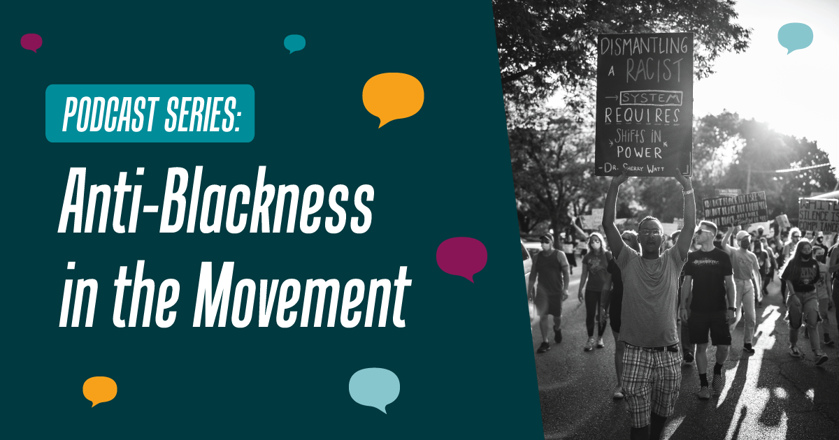 dark green background with the words "Anti-Blackness in the movement' written in white on the left, and a black and white photo of a protest, showing a person holding a sign that reads "Dismantling a racists system requires shifts in power"