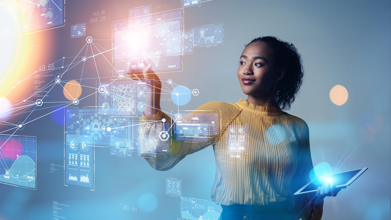 Woman touches a virtual screen that is a transparent circuit board.