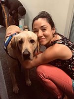 photo of claudia and a service dog