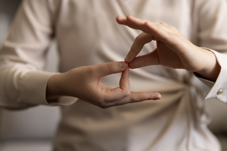 Hands signing in ASL