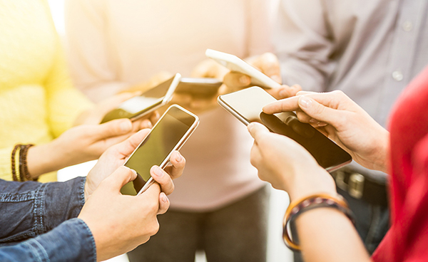 Group of people on phones