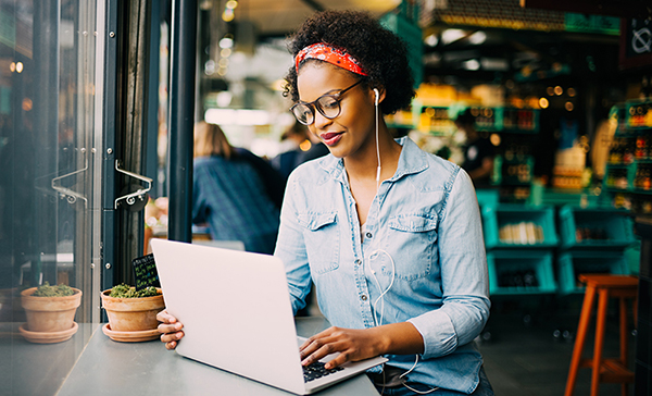 Woman typing on laptop