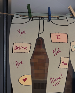 Pair of jeans hanging on a clothesline 